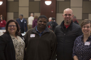 Representatives of the South Central neighborhood association (l-r): Nikki Fitzgerald, Brian Kemp, James Sandberg, and Sara Renee. The association won $1500 to use on a neighborhood project of their choosing. 