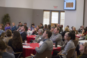 Participants listening to presentations at the food summit