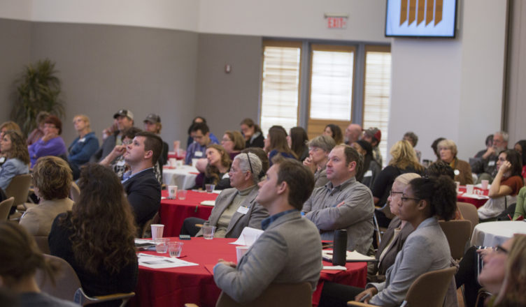 Participants listening to presentations at the food summit