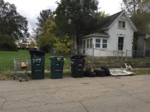 Trash and debris was cleaned and windows boarded at 741 N. Mulberry St. 