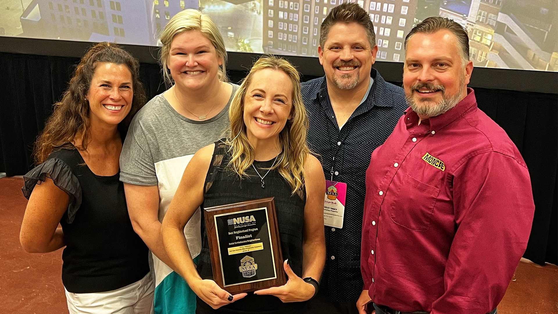 Photo of team that attended the conference to accept the award.